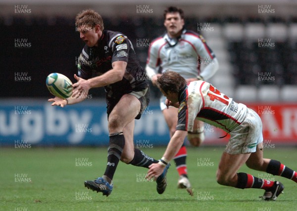 07.12.07 - Ospreys v Ulster - Heineken Cup - Ospreys' Nikki Walker is tackled by Ulster's Bryn Cunningham 