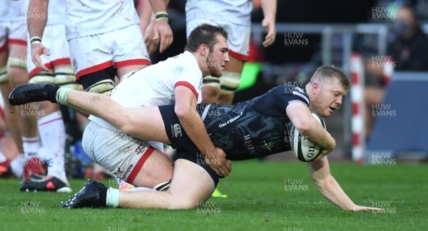 101020 - Ospreys v Ulster - Guinness PRO14 - Keiran Williams of Ospreys is tackled by Marcus Rea of Ulster