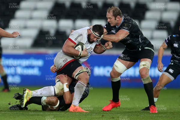 101020 - Ospreys v Ulster - Guinness PRO14 - Marcell Coetzee of Ulster is tackled by Dan Lydiate and Alun Wyn Jones of Ospreys