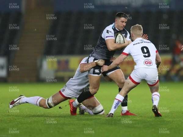 150220 - Ospreys v Ulster Rugby, Guinness PRO14 - Owen Watkin of Ospreys takes on David Shanahan of Ulster and Matthew Rea of Ulster