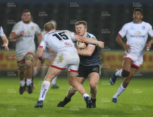 150220 - Ospreys v Ulster Rugby, Guinness PRO14 - Kieran Williams of Ospreys takes on Matt Faddes of Ulster