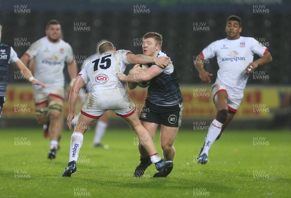 150220 - Ospreys v Ulster Rugby, Guinness PRO14 - Kieran Williams of Ospreys takes on Matt Faddes of Ulster