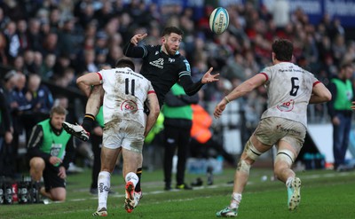 180224 - Ospreys v Ulster, United Rugby Championship - Alex Cuthbert of Ospreys is tackled by Jacob Stockdale of Ulster