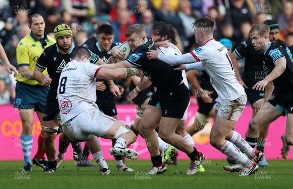 180224 - Ospreys v Ulster - United Rugby Championship - Keiran Williams of Ospreys is challenged by Nick Timoney of Ulster 