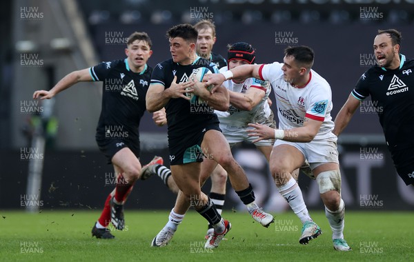 180224 - Ospreys v Ulster - United Rugby Championship - Reuben Morgan-Williams of Ospreys is tackled by Jude Postlewaithe of Ulster 