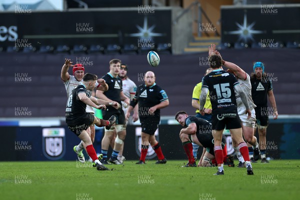 180224 - Ospreys v Ulster - United Rugby Championship - Dan Edwards of Ospreys kicks a drop goal in the last seconds of the game to win the match