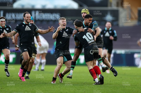180224 - Ospreys v Ulster - United Rugby Championship - Dan Edwards of Ospreys celebrates with team mates after kicking a drop goal in the last seconds of the game to win the match