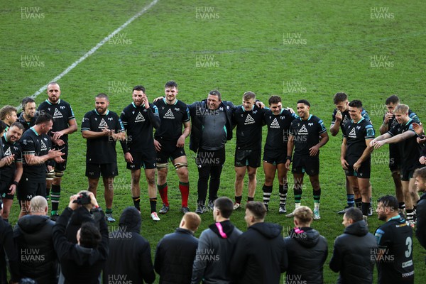 180224 - Ospreys v Ulster - United Rugby Championship - Ospreys Head Coach Toby Booth and the Ospreys celebrate in the team huddle