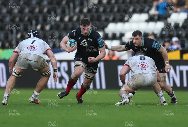 180224 - Ospreys v Ulster, United Rugby Championship - James Ratti of Ospreys takes on Marcus Rea of Ulster and Nick Timoney of Ulster