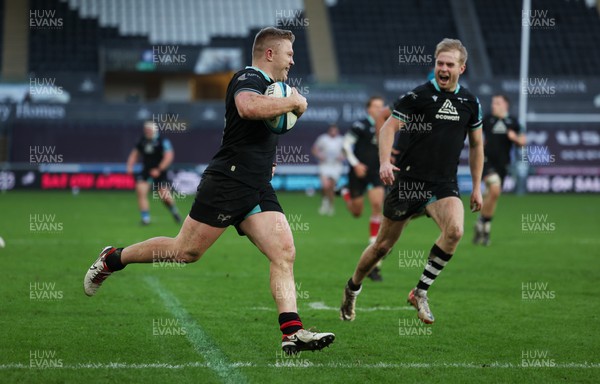 180224 - Ospreys v Ulster, United Rugby Championship - Keiran Williams of Ospreys races in to score try