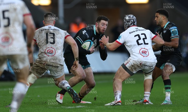 180224 - Ospreys v Ulster, United Rugby Championship - Alex Cuthbert of Ospreys takes on James Hume of Ulster and Luke Marshall of Ulster