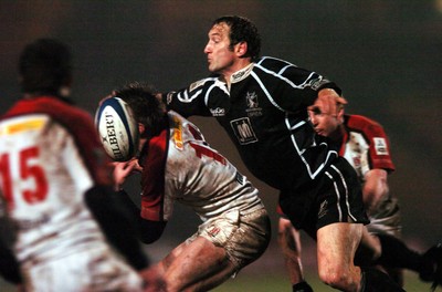 211005 - Ospreys v Ulster - Celtic League - Ospreys' Stefan Terblanche fails to retain posession as Tommy Bowe spills