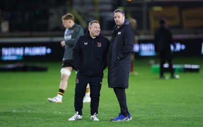 280226 - Ospreys v Ulster Rugby, United Rugby Championship - Ulster head coach Richie Murphy and Ospreys head coach Mark Jones chat ahead of the match