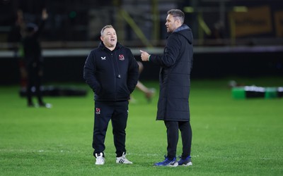 280226 - Ospreys v Ulster Rugby, United Rugby Championship - Ulster head coach Richie Murphy and Ospreys head coach Mark Jones chat ahead of the match