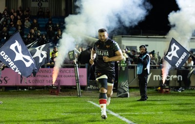 280226 - Ospreys v Ulster Rugby, United Rugby Championship - Gareth Thomas of Ospreys leads the team out on his 150th cap