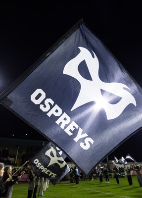 280226 - Ospreys v Ulster Rugby, United Rugby Championship - Ospreys flag held aloft by the guard of honour