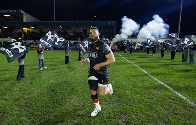 280226 - Ospreys v Ulster Rugby, United Rugby Championship - Gareth Thomas of Ospreys leads the team out on his 150th cap