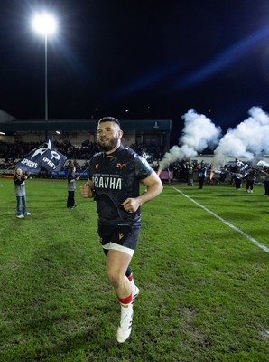 280226 - Ospreys v Ulster Rugby, United Rugby Championship - Gareth Thomas of Ospreys leads the team out on his 150th cap