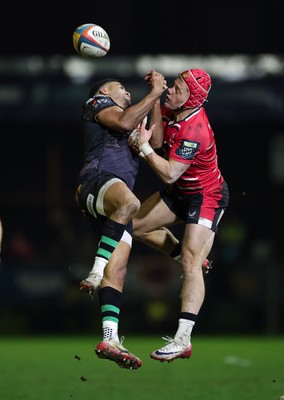 280226 - Ospreys v Ulster Rugby, United Rugby Championship - Keelan Giles of Ospreys and Michael Lowry of Ulster compete for the ball