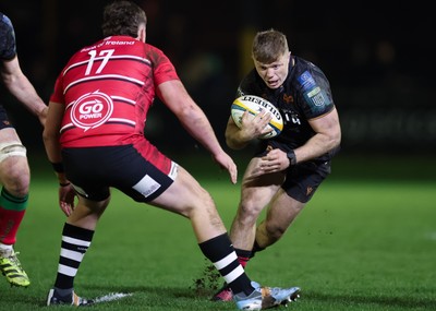280226 - Ospreys v Ulster Rugby, United Rugby Championship - Keiran Williams of Ospreys takes on Angus Bell of Ulster