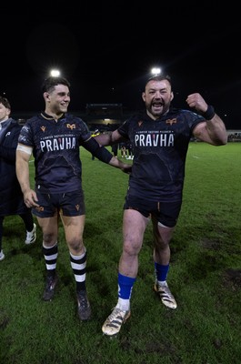 280226 - Ospreys v Ulster Rugby, United Rugby Championship - Lewis Lloyd of Ospreys and Sam Parry of Ospreys at the end of the match