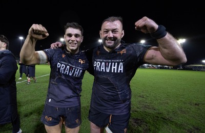 280226 - Ospreys v Ulster Rugby, United Rugby Championship - Lewis Lloyd of Ospreys and Sam Parry of Ospreys at the end of the match