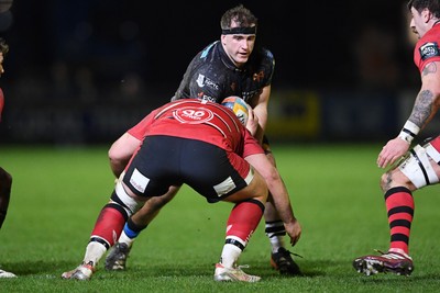 280226 - Ospreys v Ulster - United Rugby Championship - Morgan Morse of Ospreys is challenged by Eric O’Sullivan of Ulster