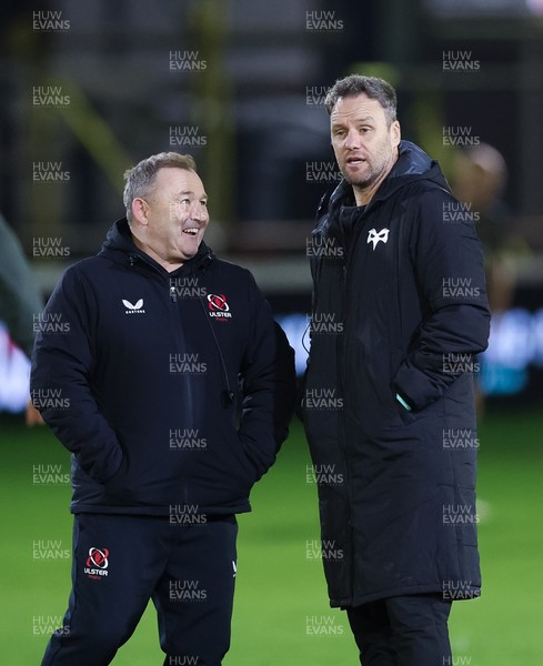 280226 - Ospreys v Ulster Rugby, United Rugby Championship - Ulster head coach Richie Murphy and Ospreys head coach Mark Jones chat ahead of the match
