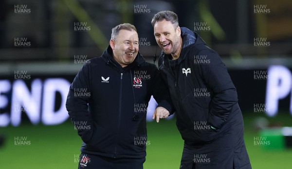 280226 - Ospreys v Ulster Rugby, United Rugby Championship - Ulster head coach Richie Murphy and Ospreys head coach Mark Jones chat ahead of the match