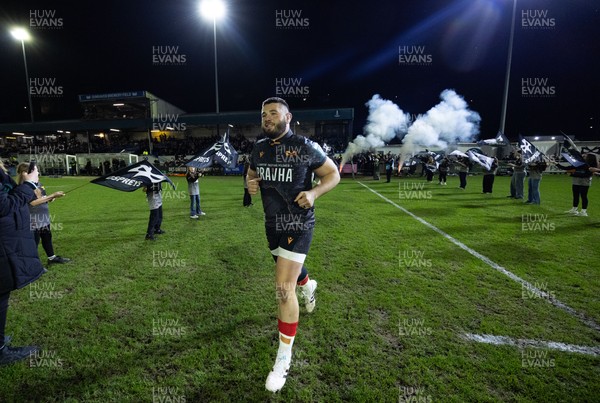 280226 - Ospreys v Ulster Rugby, United Rugby Championship - Gareth Thomas of Ospreys leads the team out on his 150th cap