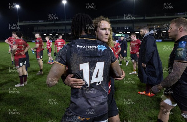 280226 - Ospreys v Ulster Rugby, United Rugby Championship - Werner Kok of Ulster and Dan Kasende of Ospreys at the end of the match