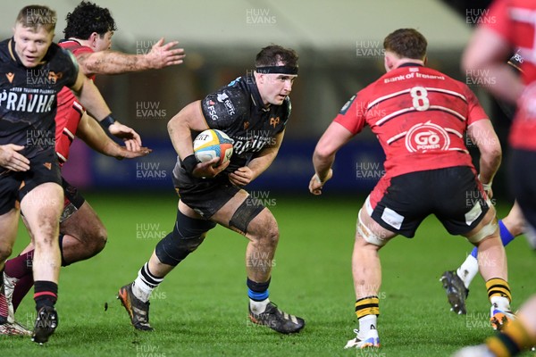 280226 - Ospreys v Ulster - United Rugby Championship - Morgan Morse of Ospreys is challenged by Bryn Ward of Ulster