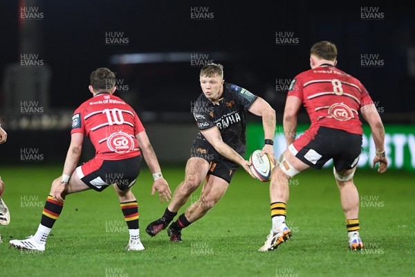 280226 - Ospreys v Ulster - United Rugby Championship - Keiran Williams of Ospreys is challenged by Jack Murphy of Ulster