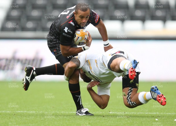 240813 - Ospreys v Worcester Warriors, Pre-season Friendly - Ospreys Eli Walker brushes off Worcester's Jeremy Su'a