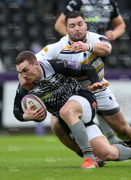 120119 - Ospreys v Worcester Warriors - European Rugby Challenge Cup - George North of Ospreys is tackled by Simon Kerrod of Worcester Warriors