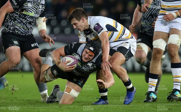 120119 - Ospreys v Worcester Warriors - European Rugby Challenge Cup - James King of Ospreys is tackled by Ryan Mills of Worcester Warriors