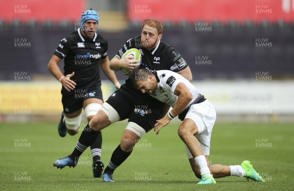 020917 - Ospreys v Zebre, Guinness PRO14 - Dan Baker of Ospreys takes on Mattia Bellini of Zebre