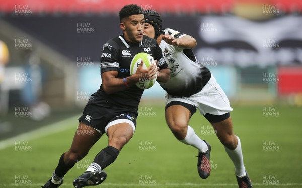 020917 - Ospreys v Zebre, Guinness PRO14 - Keelan Giles of Ospreys is tackled by Gabriele Di Giulio of Zebre