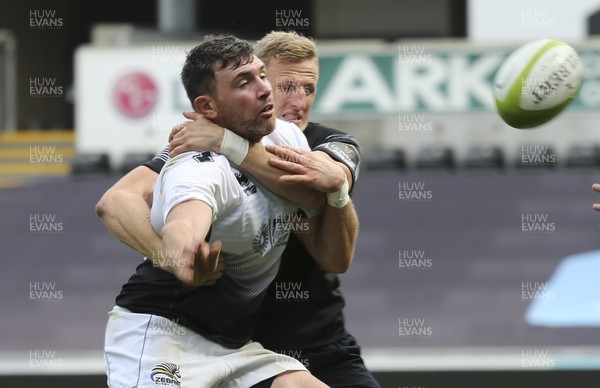 020917 - Ospreys v Zebre, Guinness PRO14 - George Biagi of Zebre gets the ball away Ben John of Ospreys closes in