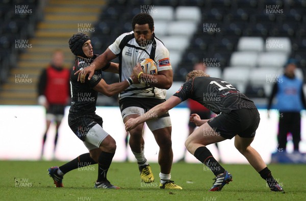 231113 - Ospreys v Zebre, RaboDirect PRO12 - Zebre's Samuela Vunisa is tackled by Ospreys' Matthew Morgan and Ospreys' Ben John