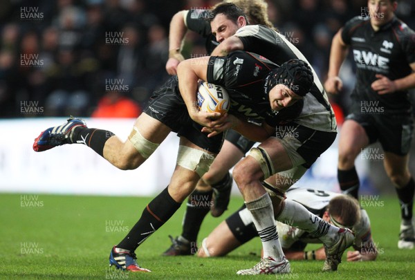 231113 - Ospreys v Zebre, RaboDirect PRO12 - Ospreys' James King is held by Zebre's Michael Van Vuren