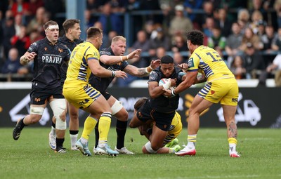 111025 - Ospreys v Zebre Parma - United Rugby Championship - Phil Cokanasiga of Ospreys is tackled by Iacopo Bianchi of Zebre Parma 