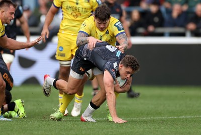 111025 - Ospreys v Zebre Parma - United Rugby Championship - Kieran Hardy of Ospreys makes a break