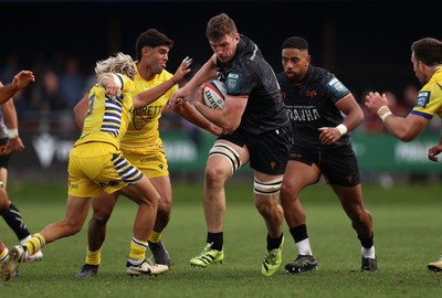 111025 - Ospreys v Zebre Parma - United Rugby Championship - James Ratti of Ospreys smashes past Thomas Dominguez of Zebre Parma 