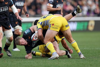 111025 - Ospreys v Zebre Parma - United Rugby Championship - Keiran Williams of Ospreys is tackled by Luca Morisi of Zebre Parma 