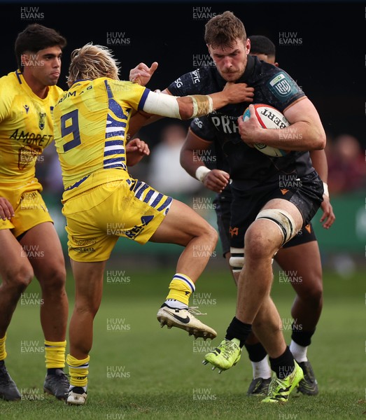 111025 - Ospreys v Zebre Parma - United Rugby Championship - James Ratti of Ospreys smashes past Thomas Dominguez of Zebre Parma 