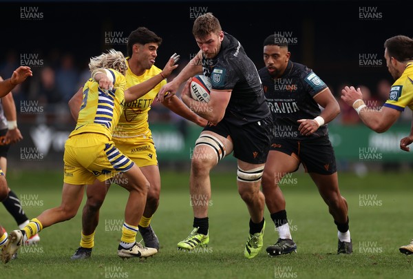 111025 - Ospreys v Zebre Parma - United Rugby Championship - James Ratti of Ospreys smashes past Thomas Dominguez of Zebre Parma 
