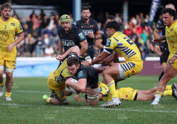 111025 - Ospreys v Zebre Parma - United Rugby Championship - James Ratti of Ospreys gets over the line to score a try