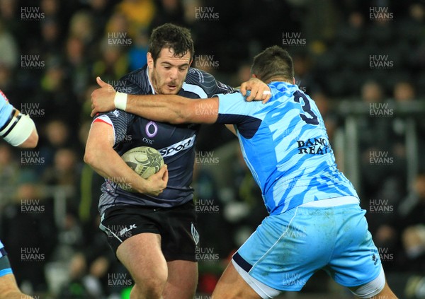 280315 - Ospreys v Zebre - GuinnessPro12 -Aaron Jarvis of Ospreys takes on Luca Redolfini of Zebre