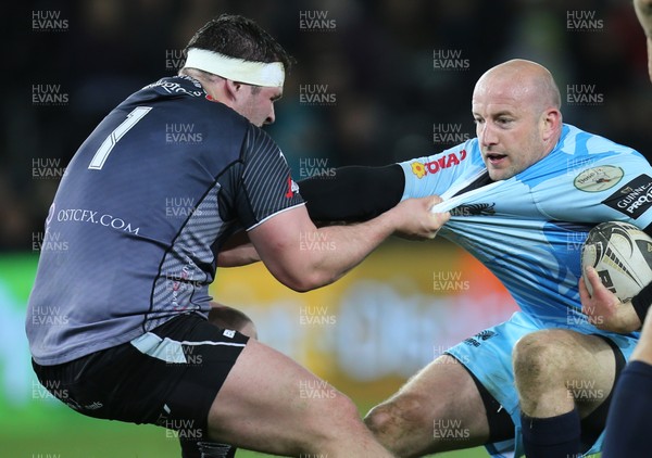 280315 - Ospreys v Zebre Rugby, Guinness PRO12 - Zebre's Brendon Leonard is held by Ospreys Ryan Bevington